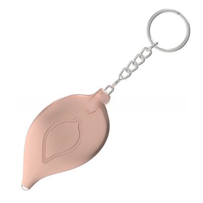 Pink keychain device with a chain on a white background