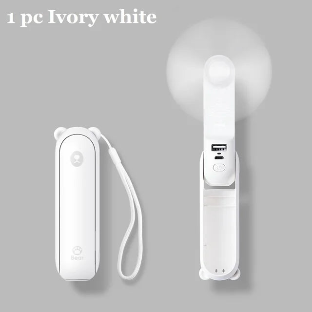 Ivory white handheld fan on a gray background