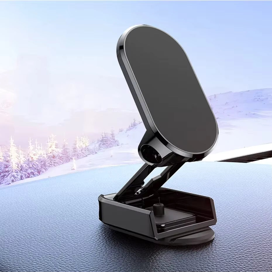 Phone holder on a car dashboard with a snowy landscape in the background