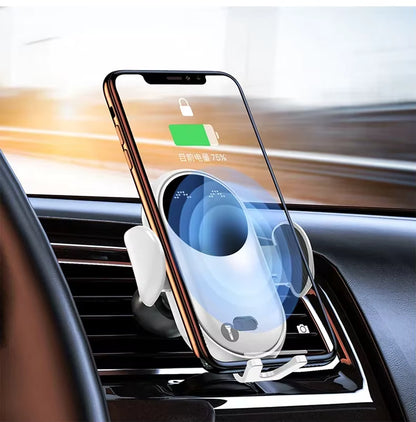 Phone with wireless charging pad on a car dashboard