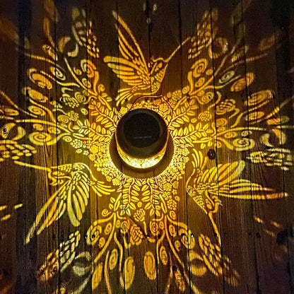 Decorative light fixture with floral patterns on a wooden surface