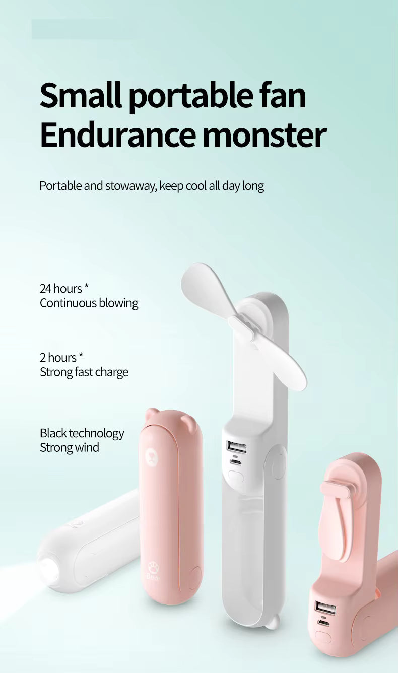 Small portable fan with text on a light blue background