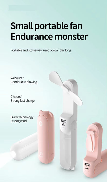 Small portable fan with text on a light blue background