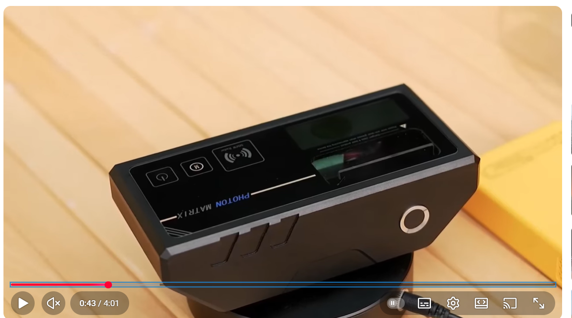 Photon Matrix with digital display on a wooden surface