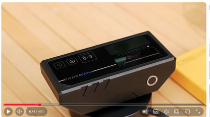 Photon Matrix with digital display on a wooden surface