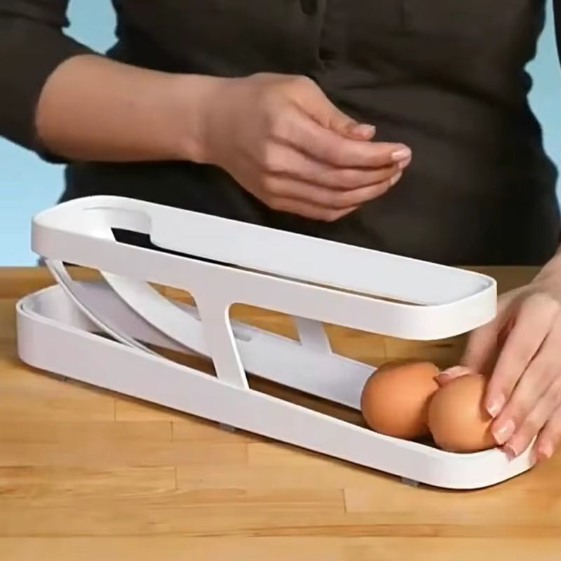 White egg holder with eggs on a wooden surface, person in dark shirt in background
