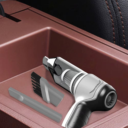 mini vacuum cleaner with attachments in a car cup holder