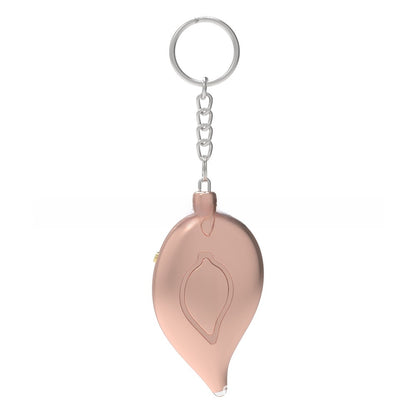 Rose gold SafePulse personal safety alarm keychain