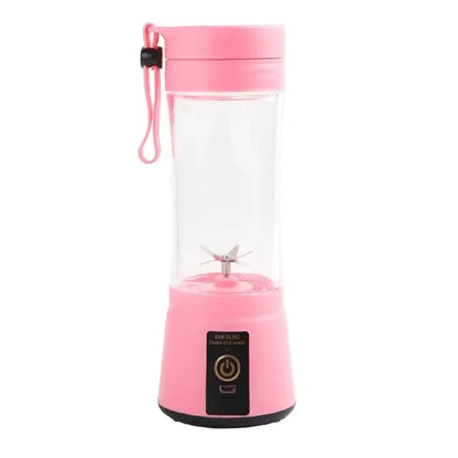 Pink portable blender with clear lid on a white background